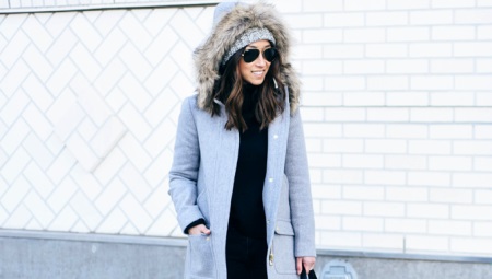 Winter women's short coat with a hood