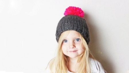 Children's hats with pom-poms
