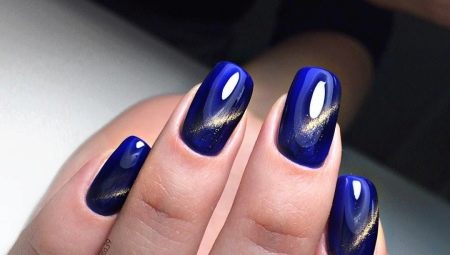 Cat's eye manicure in blue shades