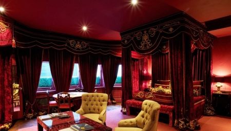 Burgundy curtains in the bedroom interior