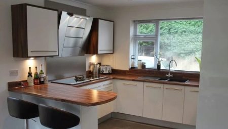 U-shaped kitchen with a bar counter: design examples
