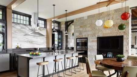 Interior design and layout of the kitchen-dining room in a private house