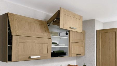 The depth of the upper cabinets in the kitchen