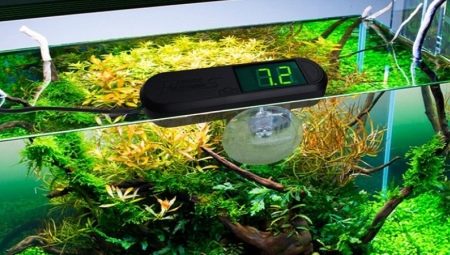 How do I lower the pH in my aquarium?