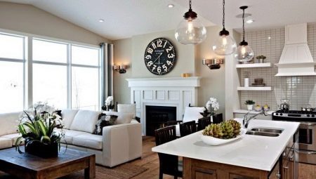 Kitchen-living room with fireplace: interior design for an apartment and a country house