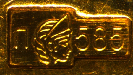 All about the stamp on gold