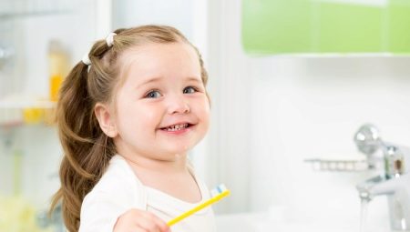 How to teach a child to brush their teeth?