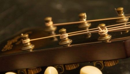 How to change strings on an acoustic guitar?
