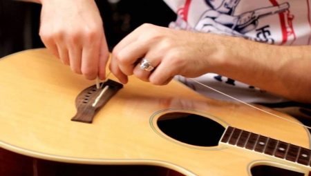 How to change strings on a guitar?