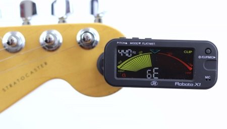 Accorder une guitare par un accordeur