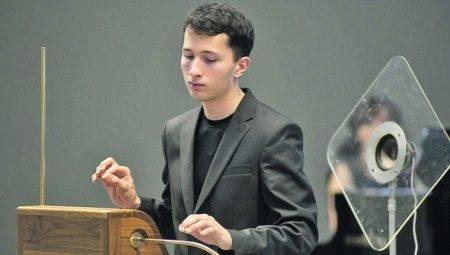 What is a theremin and how is it played?
