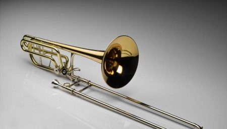 What are trombones and how are they played?