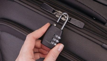 How to open the combination lock on the suitcase?