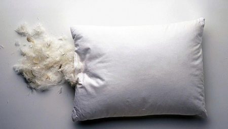 How do I clean and wash my feather pillow?