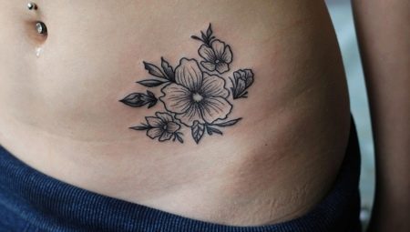 Variété de tatouages sur le ventre