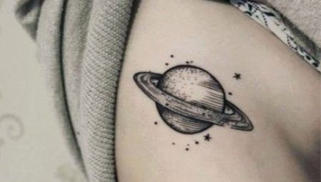 Tattoo in the form of the planet Saturn
