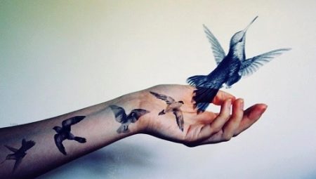 Bird tattoo on hand