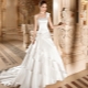 A fluffy wedding dress with a train - an outfit worthy of queens