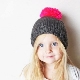 Children's hats with pom-poms