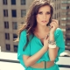 What is the mint color combined with in clothes?