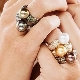 Ring with black pearls