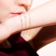 Women's gold chain on the hand