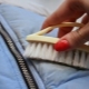 How can a paint stain be removed from a jacket?