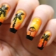 Black and orange manicure: charm and attractiveness