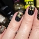 Black manicure with gold: stylish ideas and technique options