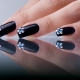 Black manicure with rhinestones - shine and mystical mystery