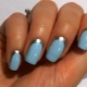 How to decorate a blue manicure with the addition of silver?