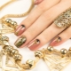 Manicure with elements of gold color: decor features and fashion trends