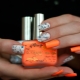 Bright and unusual ideas for combining white with orange shades in manicure