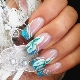 Features of the design of a turquoise jacket on nails
