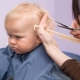 How to cut a boy with scissors at home?