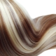 White strands on dark hair: who suits and what dyeing techniques exist?