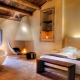 Fireplace in the bedroom: purpose, types and choice