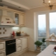 Kitchen design 12 sq. m with balcony
