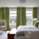 Features of the use of green curtains in the interior of the bedroom