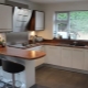 U-shaped kitchen with a bar: design examples