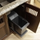 Sliding bins under the sink