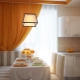 Kitchen design 9 sq. m with sofa