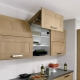 The depth of the upper cabinets in the kitchen