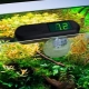 How do I lower the pH in my aquarium?