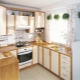 Kitchen set with a window in the middle: types and choice of kitchen