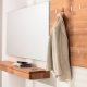 Wall hooks for clothes in the hallway: what are they and how to choose?