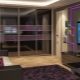 Sliding wardrobe in the living room: types, choices and options in the interior