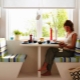 Table by the window in the kitchen: features and design options
