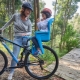 Children's bicycle seats on the trunk: varieties, recommendations for choosing