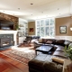 Living room interior with fireplace in a private house: design nuances and stylish solutions